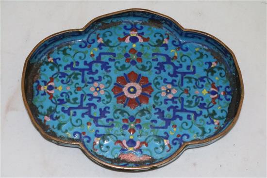 An unusual Chinese enamel on copper quatrefoil-shaped tray, Qianlong four character mark and of the period (1736-95), 18cm, damage and